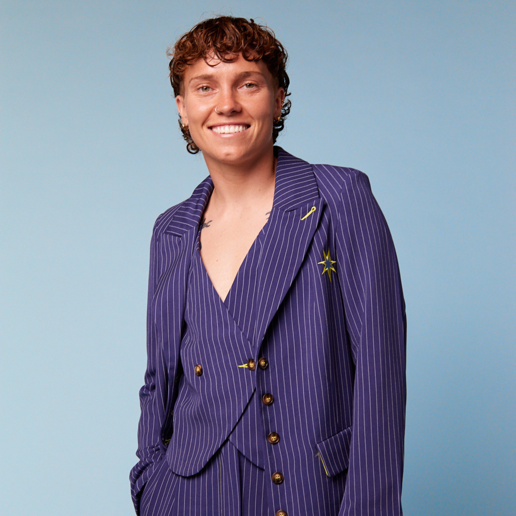 Tilly Lucas-Rodd wearing our Tripp Suit I Transform Transwear