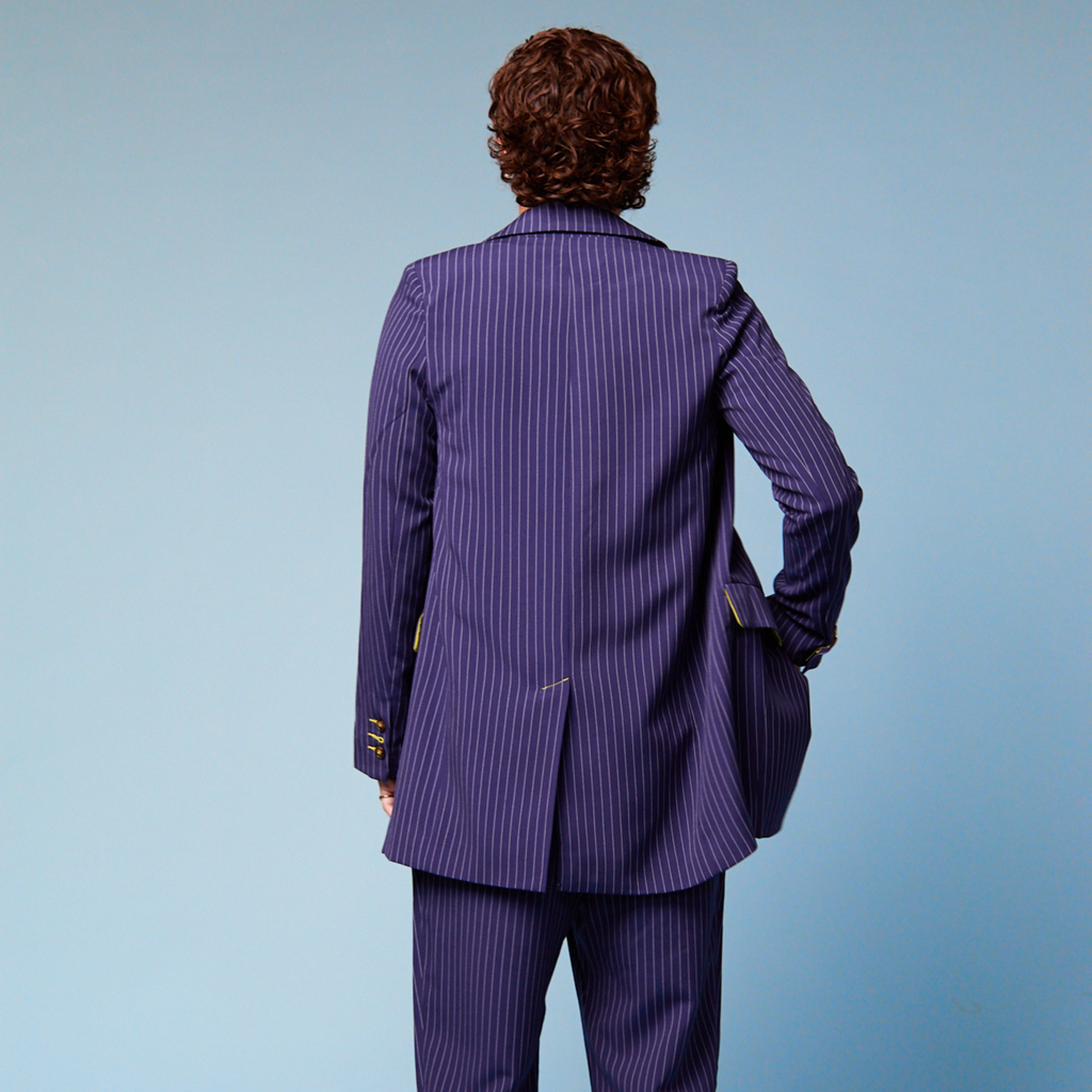 Tilly Lucas-Rodd wearing our Tripp Suit I back view I Transform Transwear