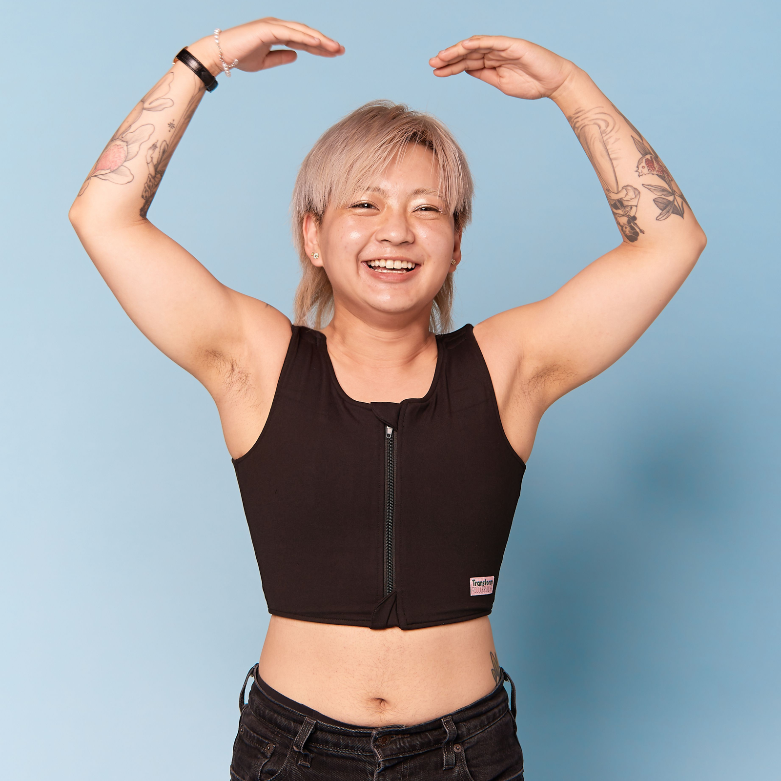 Model wearing a post operative chest binder