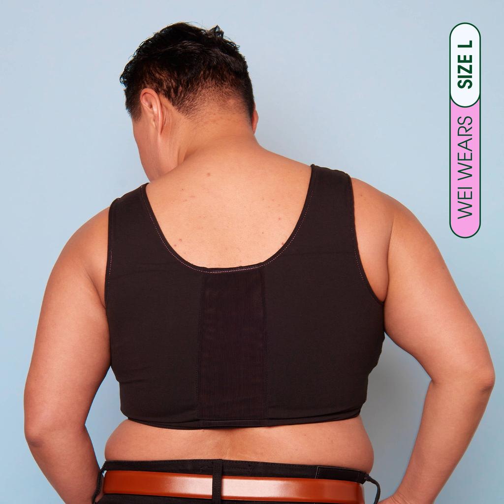 Wei wearing our maximum compression, adjustable and breathable chest binder - Rear View showing breathable panel