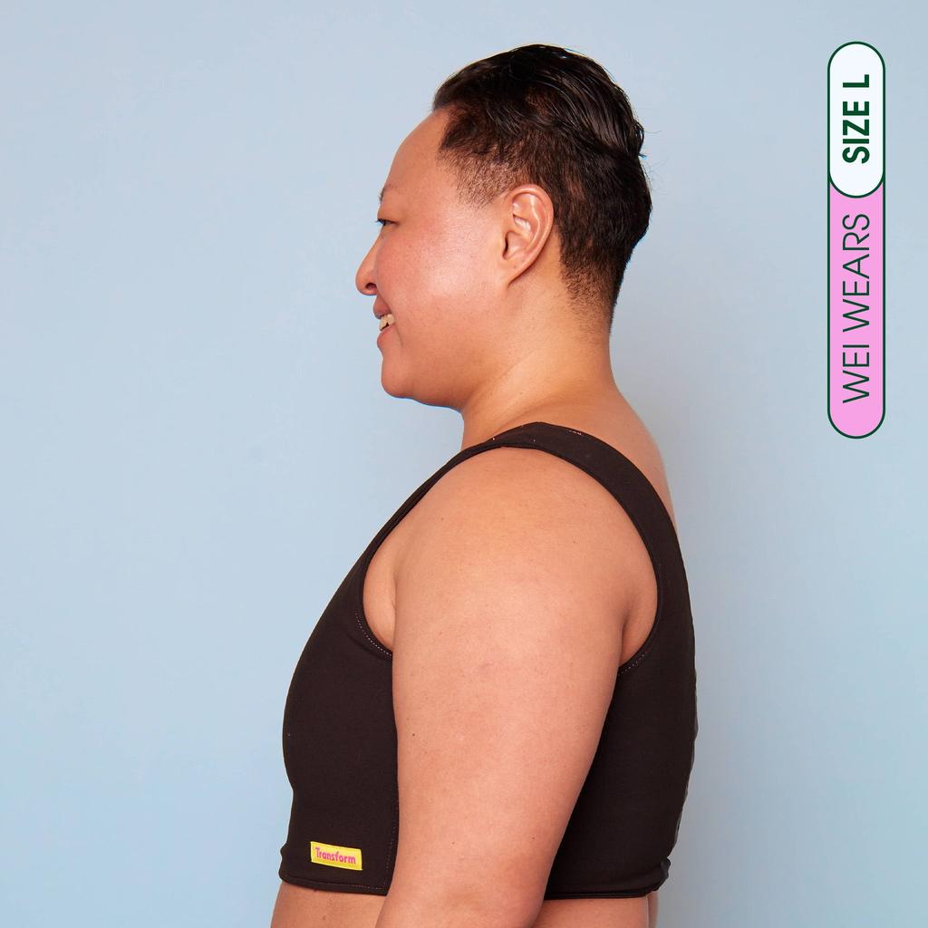 Wei wearing our maximum compression, adjustable and breathable chest binder - Side View showing Chest Binder flattening chest