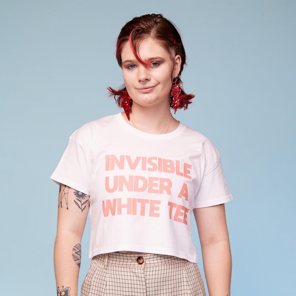 Model wearing Chest Binder Peach under white tee