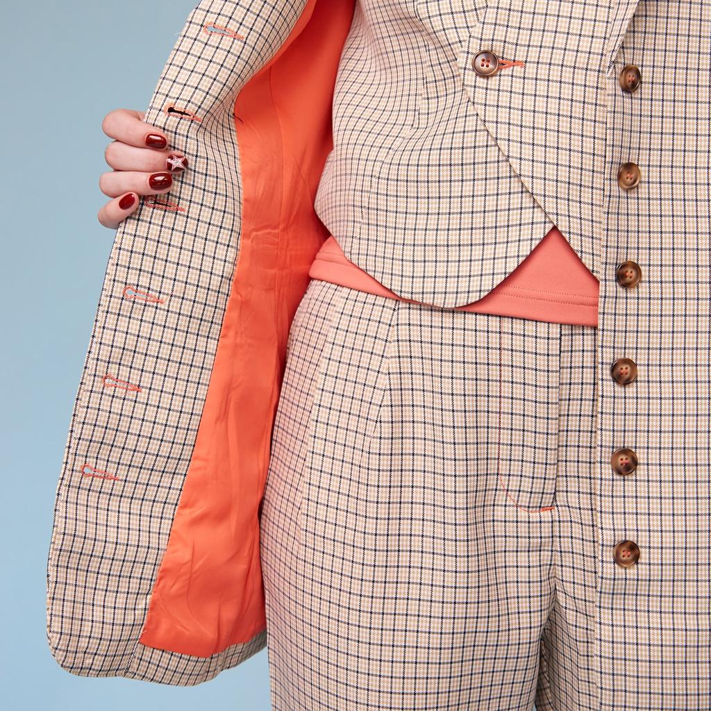 Close up of our trans masc suit 