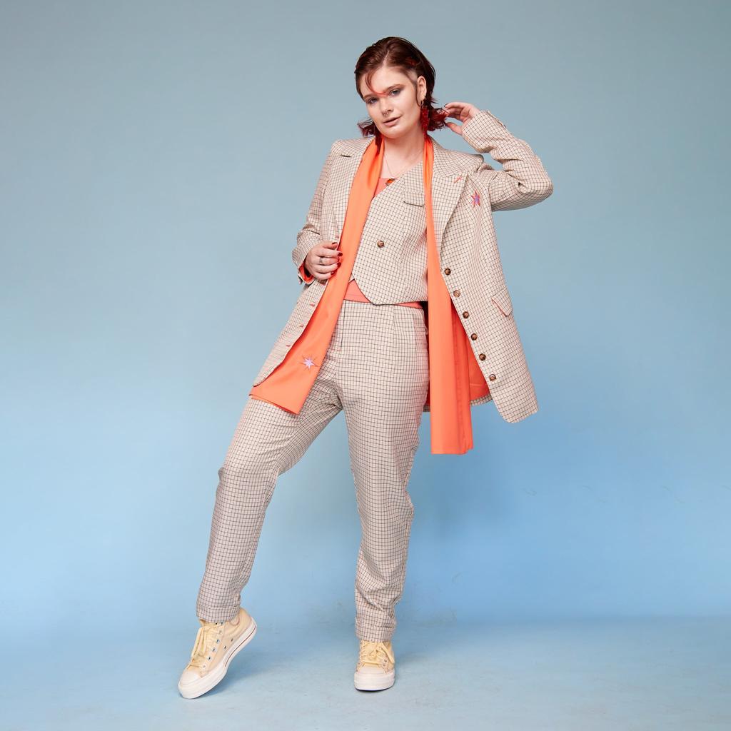 Model wearing scarf in Peach - front view