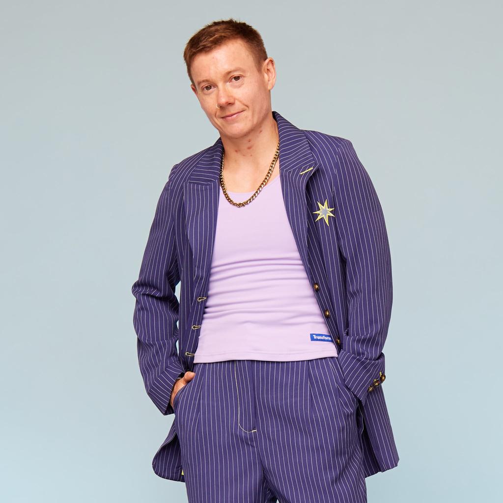 Model wearing Lavender Chest Binder and Blue Blazer - front view