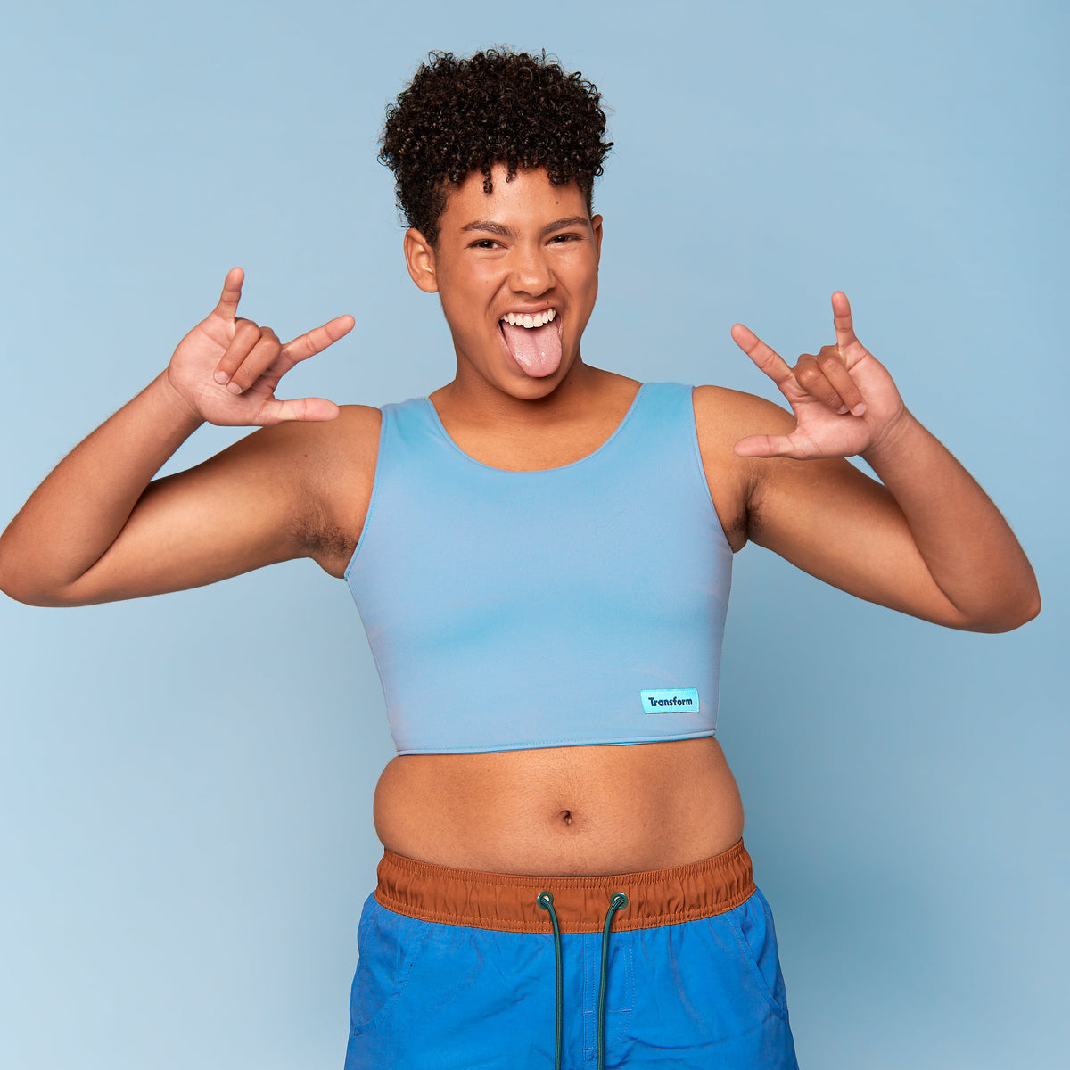 Tobi is wearing breathable ftm Swim Binder  - front view