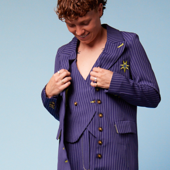 Tilly Lucas-Rodd wearing our Tripp Suit I Transform Transwear