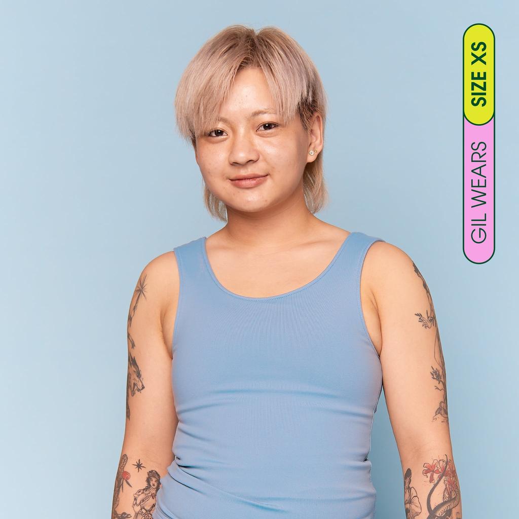 Model wearing Swim Binder Tank – front view showing full coverage fit