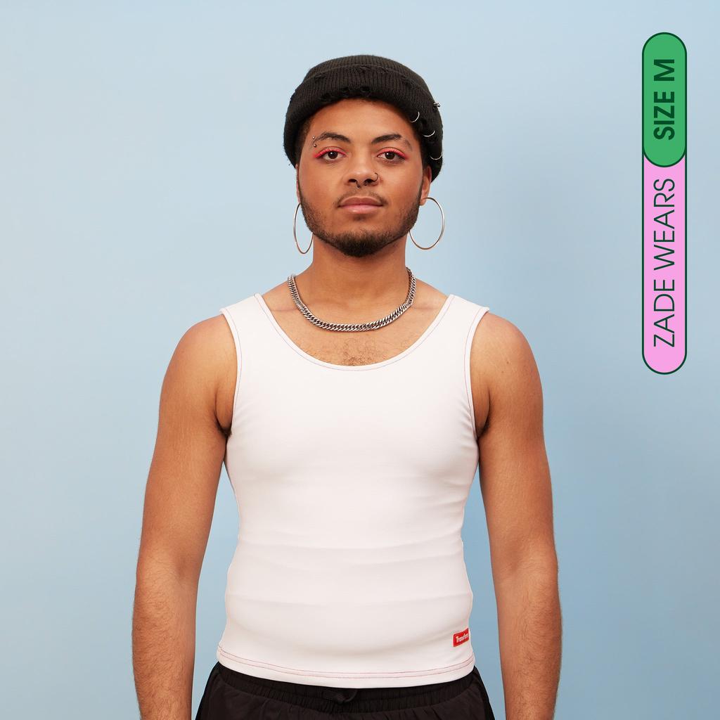 Zade wearing white, breathable chest binder tank - front view