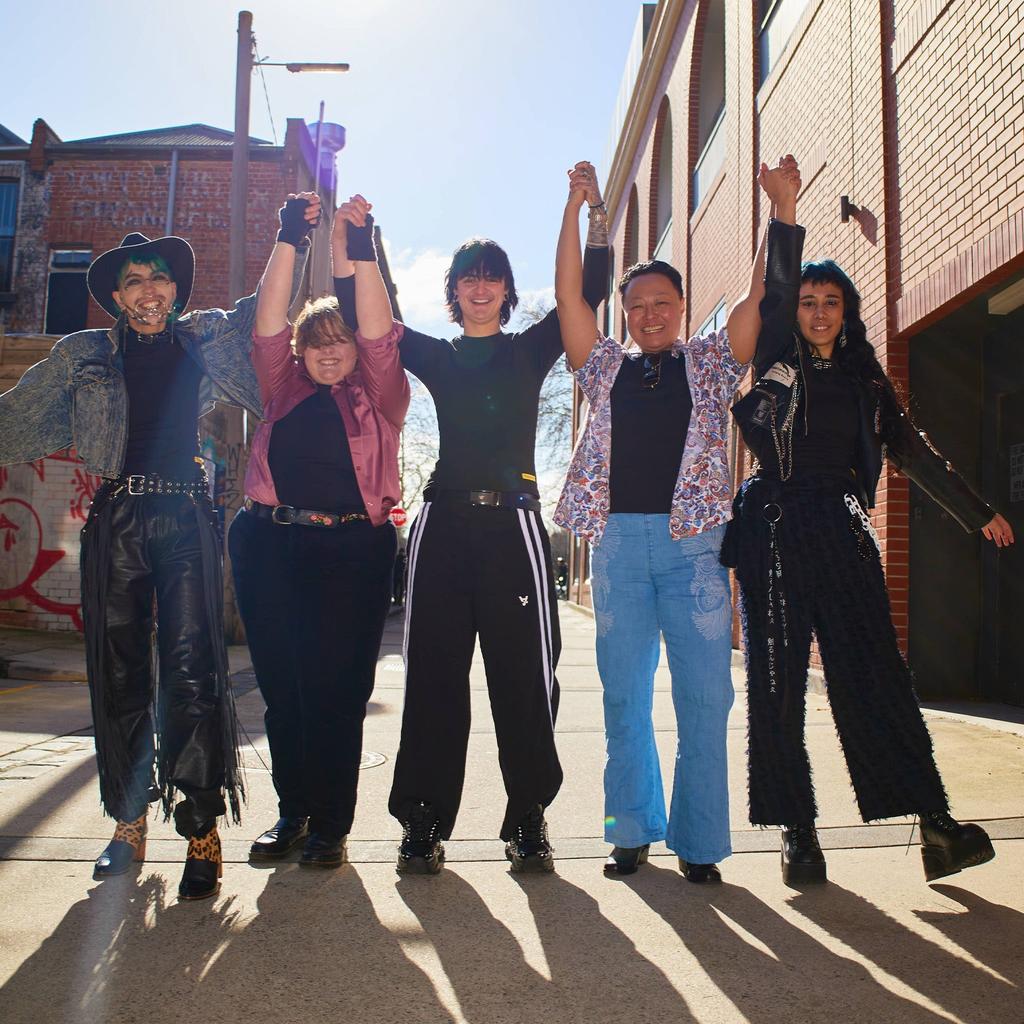 Models of all sizes all wearing compression t-shirts looking euphoric - Transform Transwear